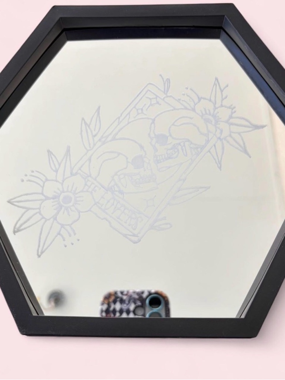 Black Hexagon Wall Mirror with Etched Skull Floral Design